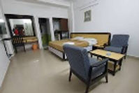 coconut-ivy-resort-and-spa-bed-room_edited.jpg