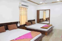 mudra-beach-resort-bed-room_edited.jpg