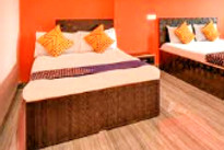 hotel-nisarg-patas-bed-room_edited.jpg