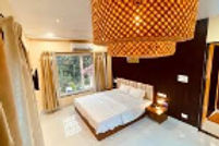 lotus-holiday-resort-bed-room_edited.jpg