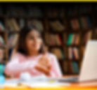 A young latin girl in a virtual learning session communicates online using sign language.