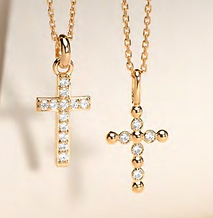 deux colliers croix sertis de brillants