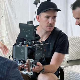 Behind the scenes showing our director talking with the DOP