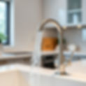 create a video loop of clean water flowing from a faucet in a nice modern kitchen, make it