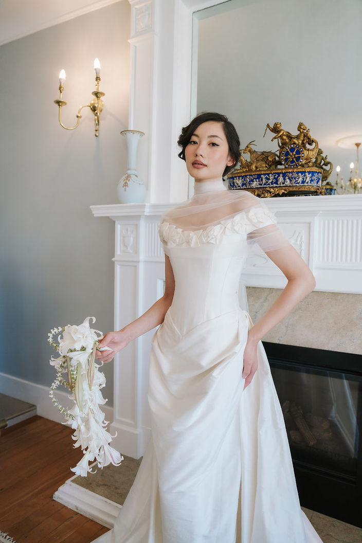 Regal wedding vintage bridal gown with modern cascading bridal bouquet