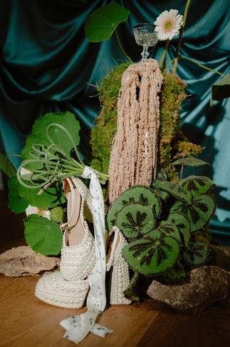 sculptural fashion floral installation luxurious moss and velvet