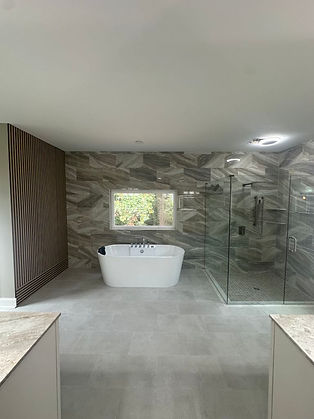 Modern bathroom with soaking tub and frameless glass shower Kennesaw GA Perspective Designs