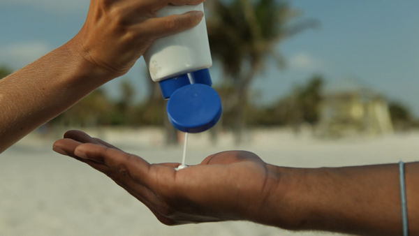 Sunscreen application. Photo courtesy of AAD