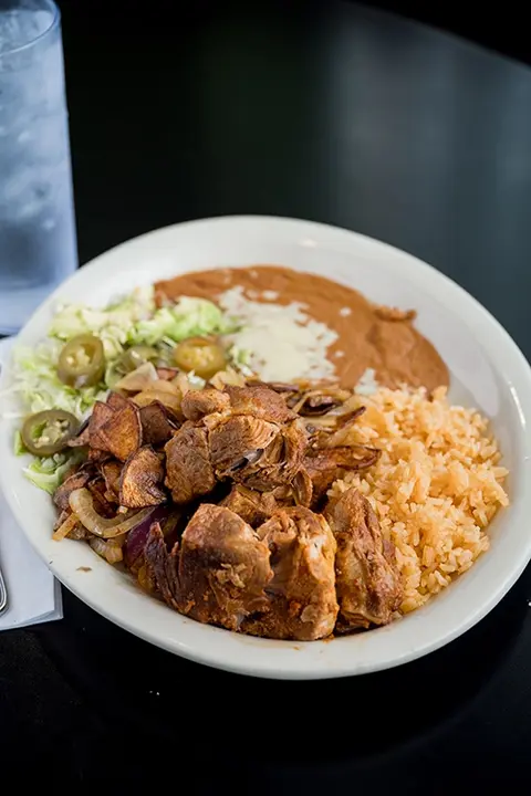 Las Palmas carnitas dinner with rice and beans
