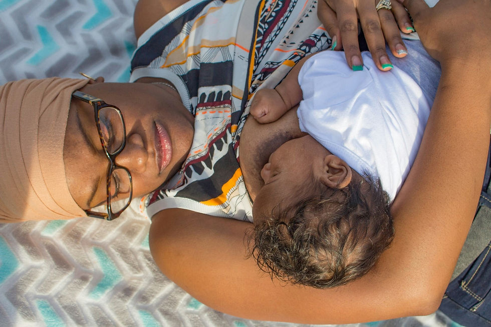 Close-up view of a breastfeeding support pamphlet on a clinic table