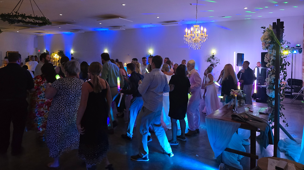 Close-up view of colorful DJ lights illuminating a dance floor