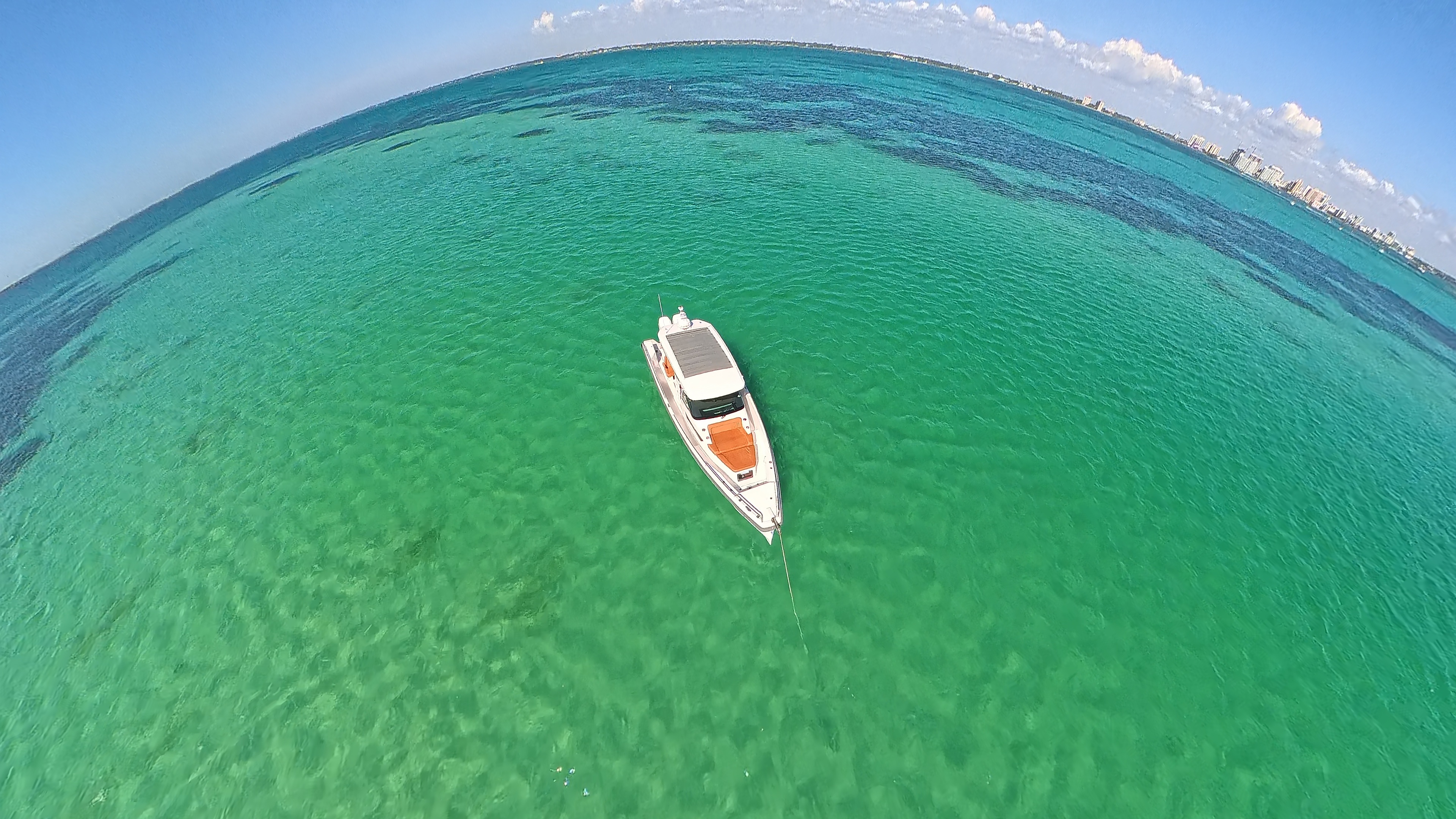 The Axopar in clear Gulf water