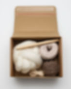 Box with yarns and dowel
