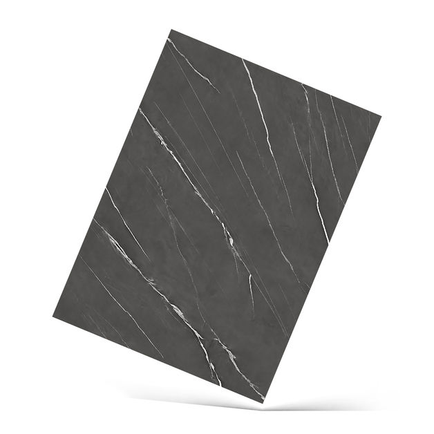 Vizcaya Melamina Vesto Textura Diseño de piedra mármol en color negro con una estructura atrevida de vetas blancas. Vizcaya aporta sofisticación, elegancia y una dosis de glamour a los espacios.