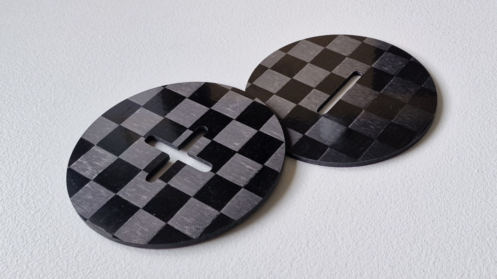 Plus/Minus Carbon Fibre Coasters (Pair)