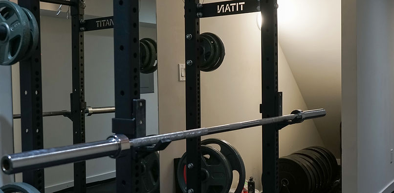 Dumbbells and weights at Triad Wellness