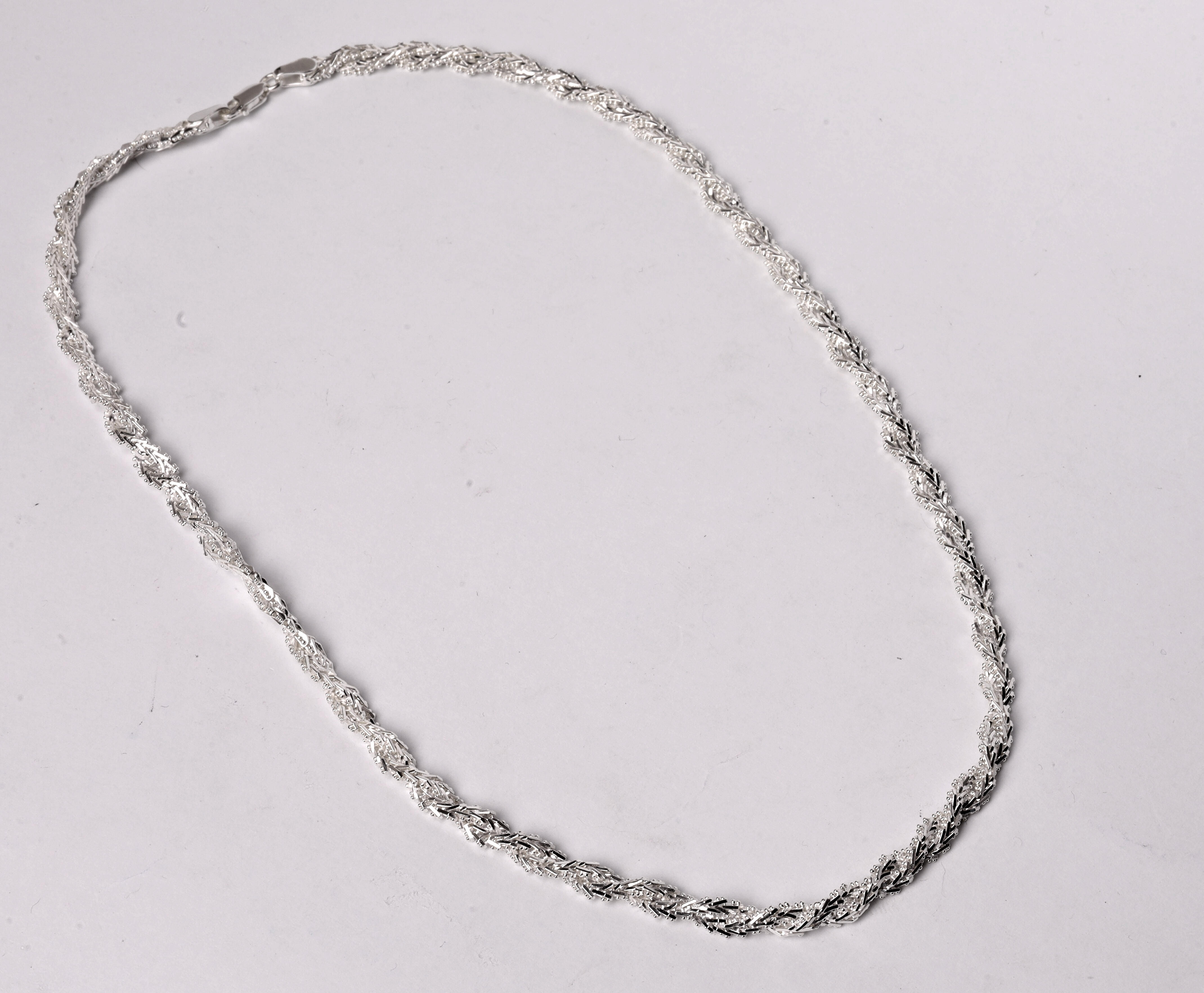 Collar trenzado boleado