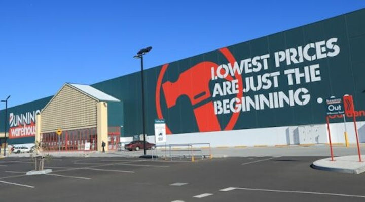 Large photograph of the front of a bunnings store and carpark