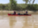 Loaded canoe on the river