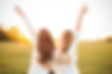 Young women are having fun on the green field in the evening..jpg