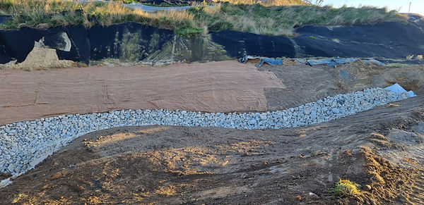 Waterway earthworks carried out with machinery under controlled conditions