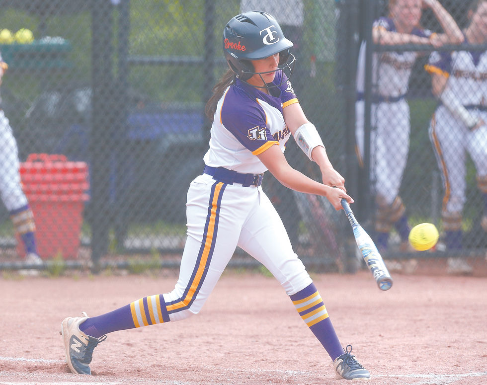Bella Barry connects for a second inning triple to ignite a four-run rally.