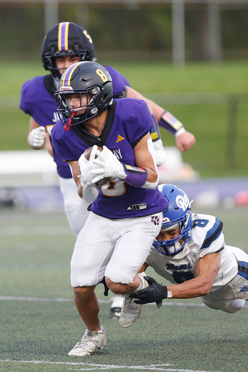 Chase Carvajal picks up positive yardage.