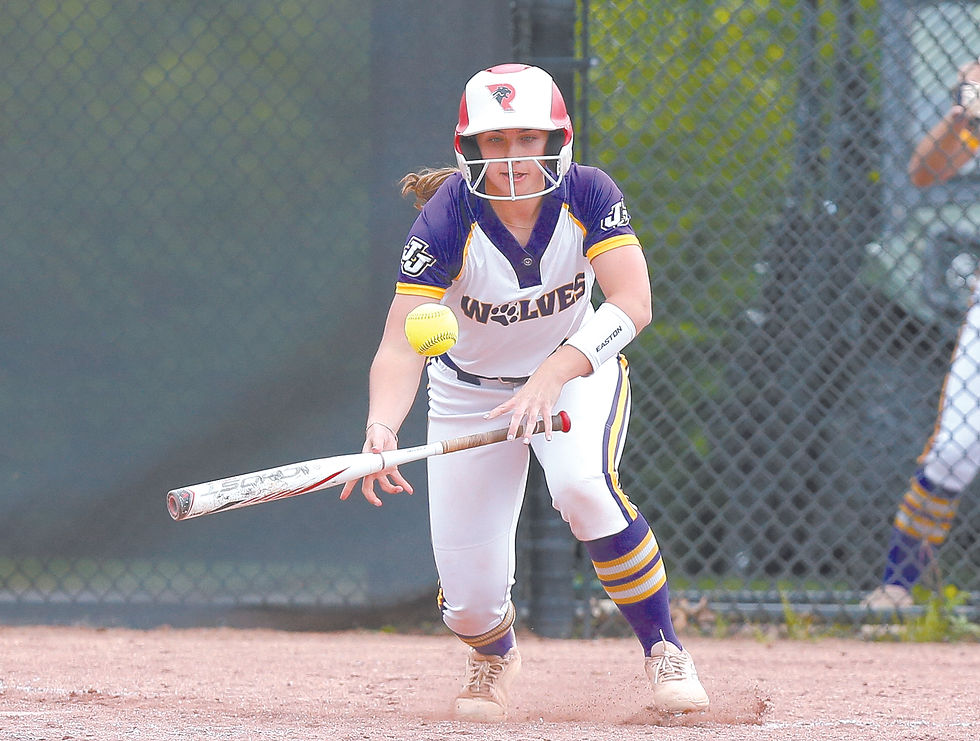 Laney Daly lays down a bunt for a hit.