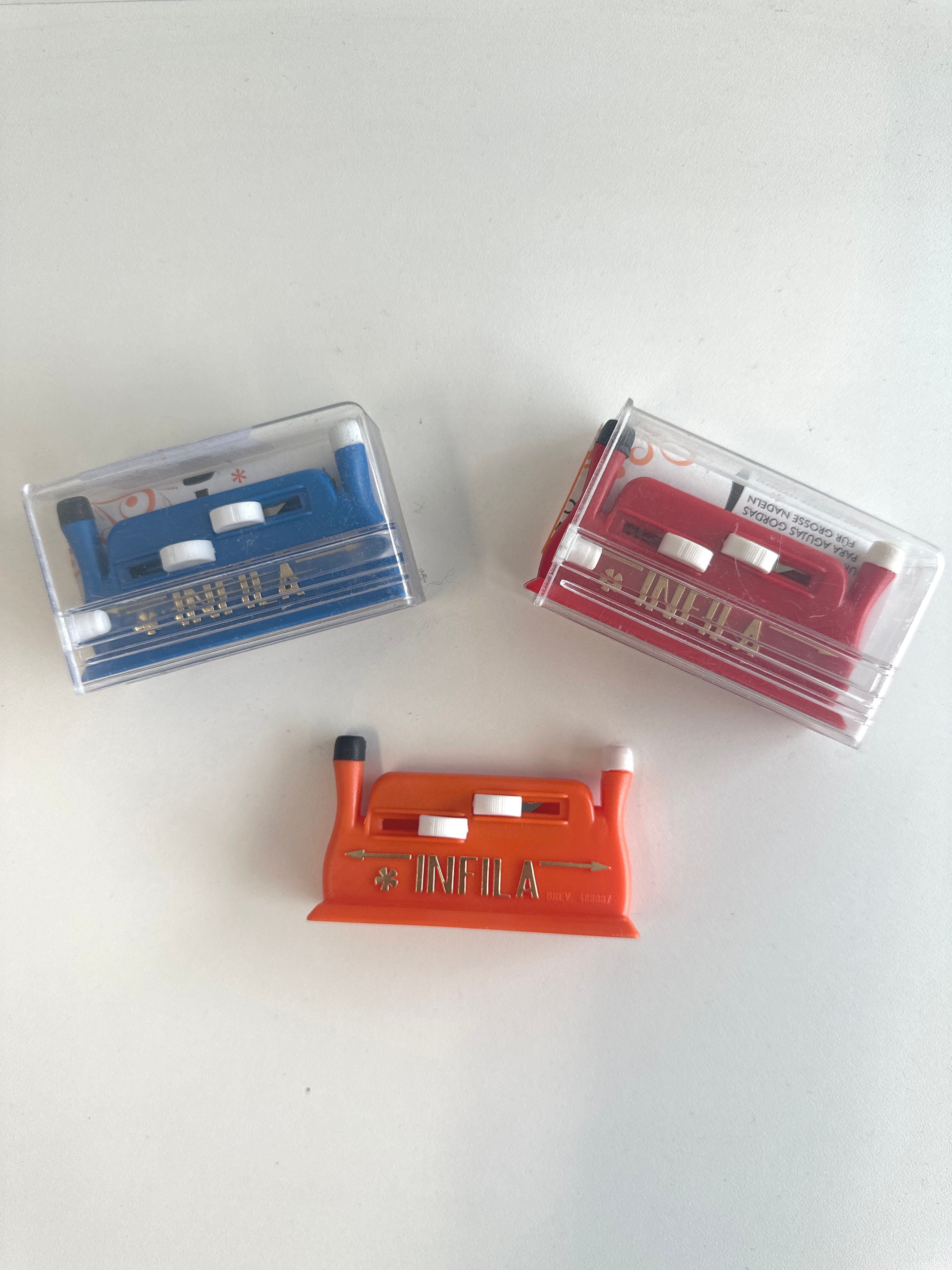 Automatic needle threader by Infila