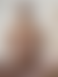 Woman in pink activewear sits cross-legged meditating with incense. Calm ambiance, plant nearby, text "SOUL TRIBE MEDIA" visible.