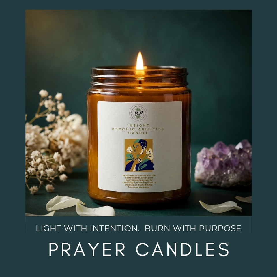 Lit amber jar prayer candle with Beads and Potions Insight Psychic Abilities label, surrounded by dried white flowers and an amethyst crystal cluster on a dark teal background.