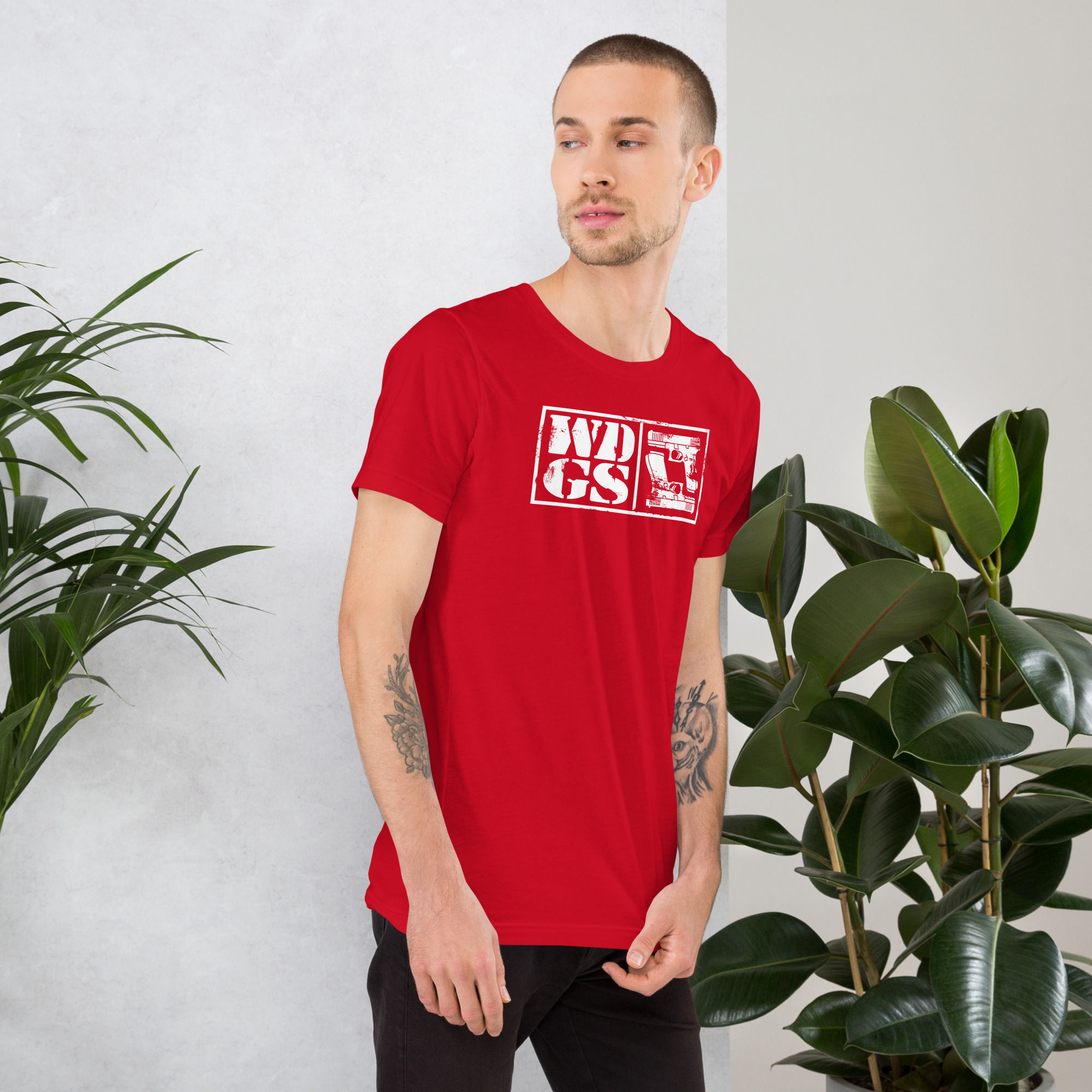 Unisex t-shirt pistol logo front, name down back