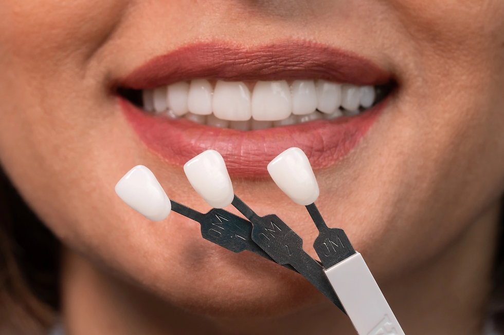 Patient reviewing porcelain and composite veneer options with a cosmetic dentist.