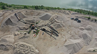 Aggregate crushing and screening operation producing construction materials