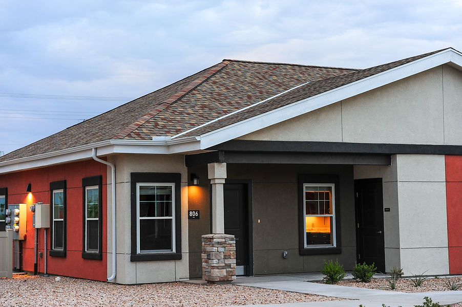 Exterior view of single-story senior living apartment