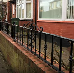 black railings with a decorative pattern - Copy.PNG
