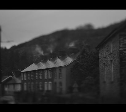 Black and white photo of a row of houses in North Wales