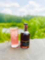 The Cocktail Architect Hibiscus Rose Syrup and a cocktail in nature