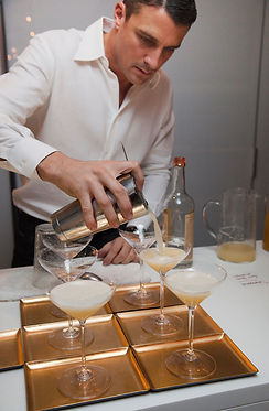 Yusef Mixolgist pouring a drink .jpg