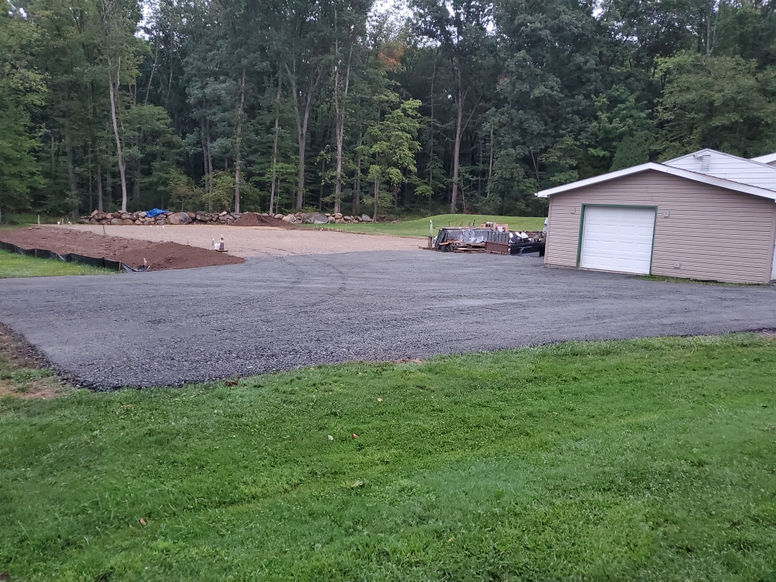 Finished driveway and site preparation before structure build 
