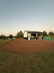Completed excavation and grading project with finished site ready for construction