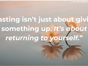 flowers reflected on water with quote "fasting isn't just about giving something up. It's about returning to yourself" by Sherri M. Herman