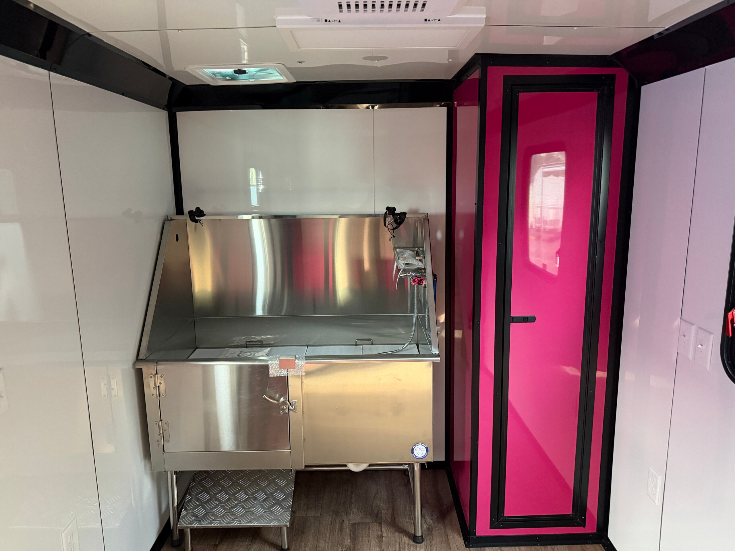 7x14 White Genesis Series Pet Grooming Trailer with 50 inch Flying Pig tub and full grooming equipment for sale.