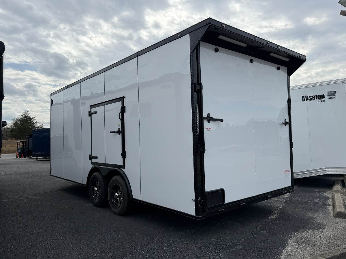 Deep South 8.5x20 enclosed cargo trailer with white Polycore exterior, blackout package, alloy wheels, rear spoiler with LED light, and escape door.
