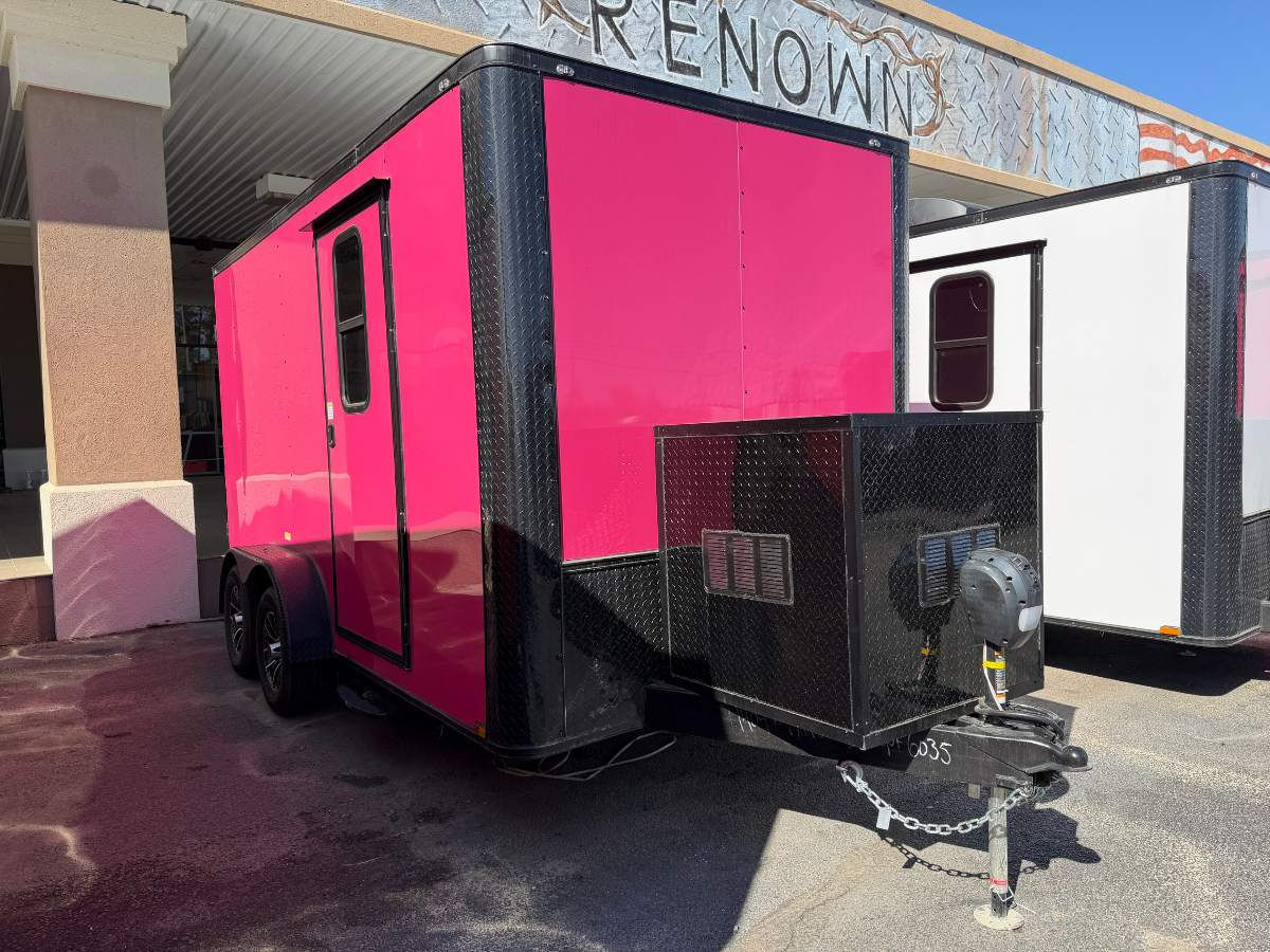 Pink Genesis Series 7x14 mobile pet grooming trailer with blackout trim, Flying Pig tub, water tanks, generator compartment, alloy wheels, and air conditioning.