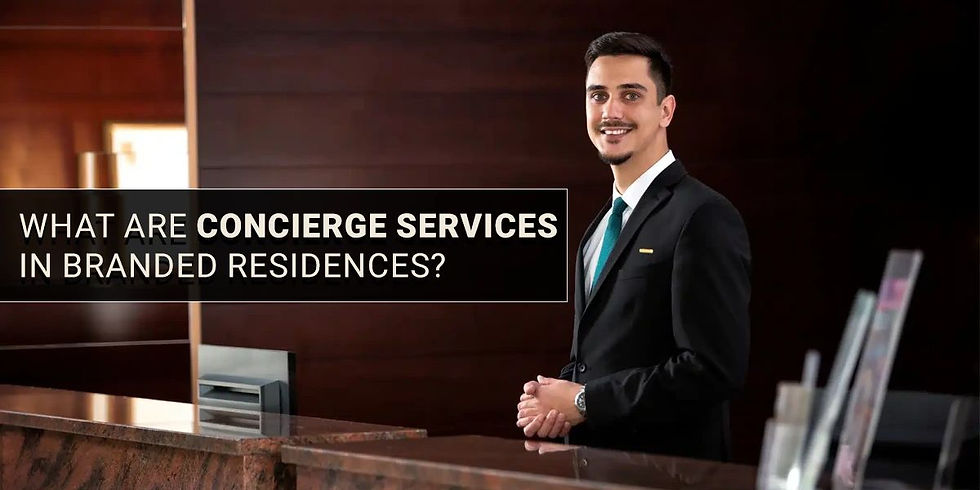 Concierge staff assisting residents at luxury branded residence reception desk