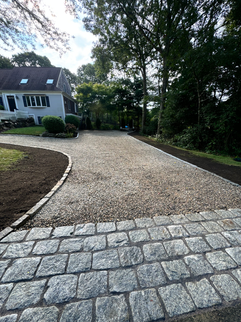 Stone driveway with cobblestone apron