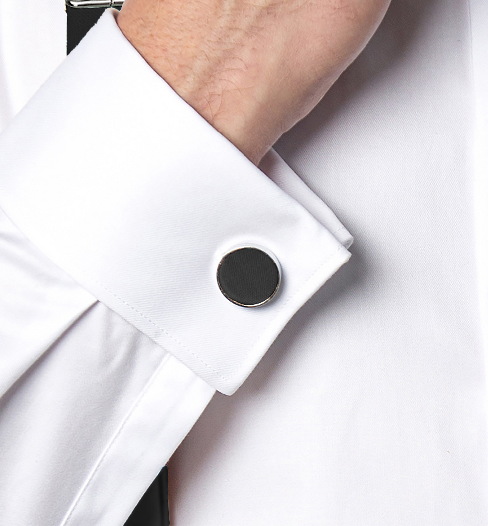 Miniaturbild: Black cufflink worn with a white shirt