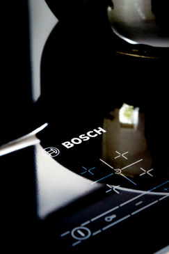 Close-up detail of a Bosch induction hob