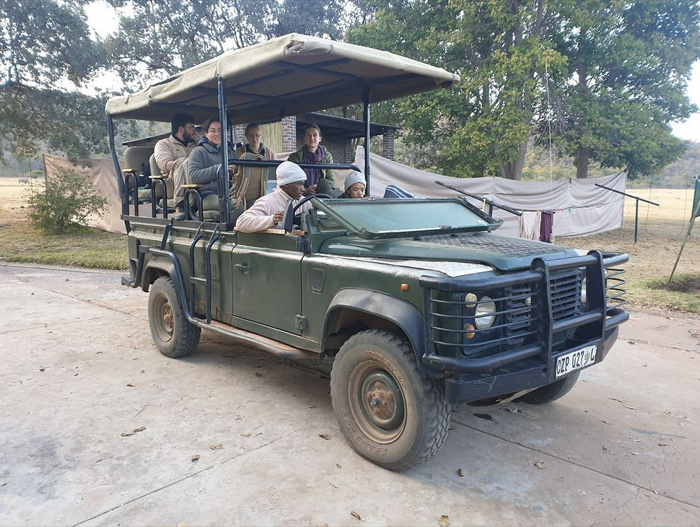 Students and volunteers in a vehicle ready to leave camp as part of the conservation project in South Africa